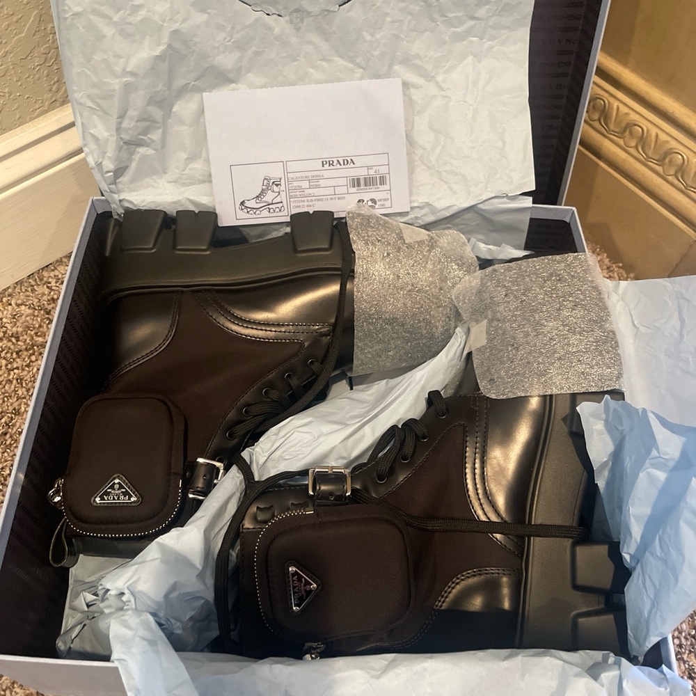 Brand new Prada boots never worn. Bought the wrong size and to late to return